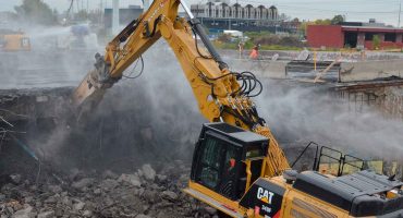 Imatges que il·lustren els processos de planificació i execució d'enderrocs segurs i eficients realitzats per Excavacions Girona.